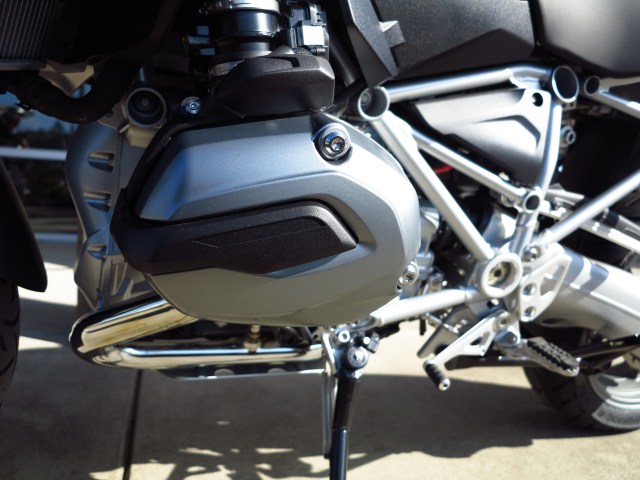 Integrating gear box with motor, result in smaller package, despite water cooling portions of it.