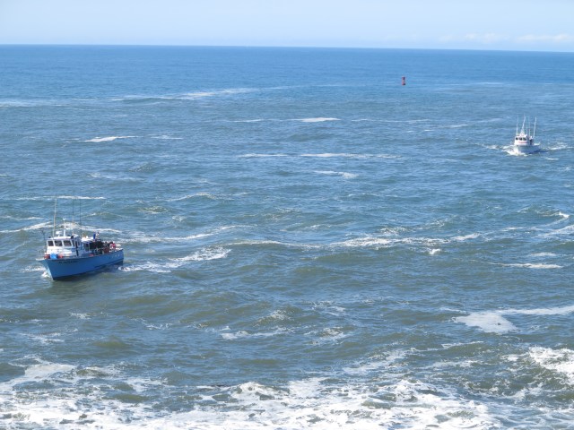 Boats approaching the channel to the harbor