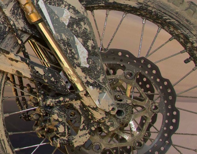 Front forks, about 7 inches of travel.