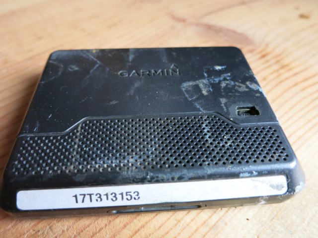 The back of the Nuvi 260 after tape was removed after its retirement. The same Gorilla tape lasted all years of use!
